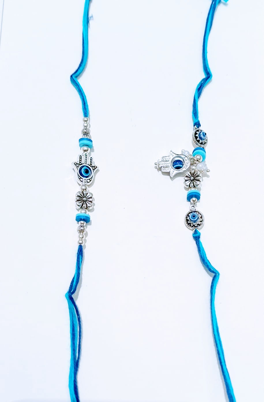 Couple Bhaiya-bhabhi Rakhi with Evil Eye and Floral Design, Hamsa Hand Bracelet in Blue