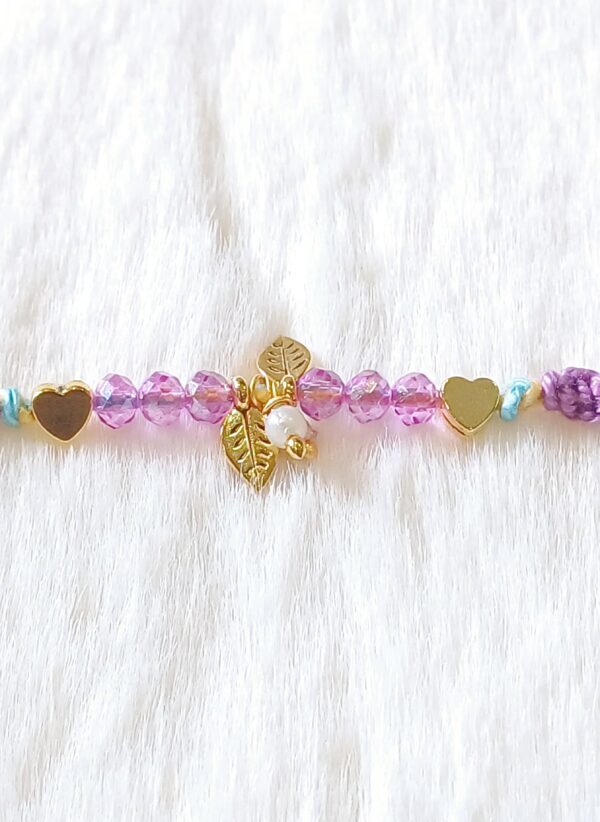 Violet color with leaves and pearl Rakhi