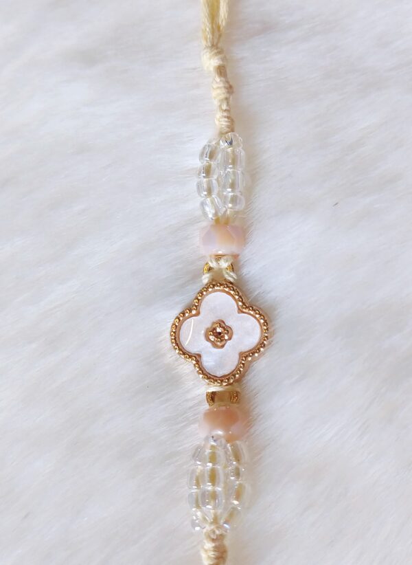 Yellow, Golden and White color with Flower Design Rakhi - Image 3