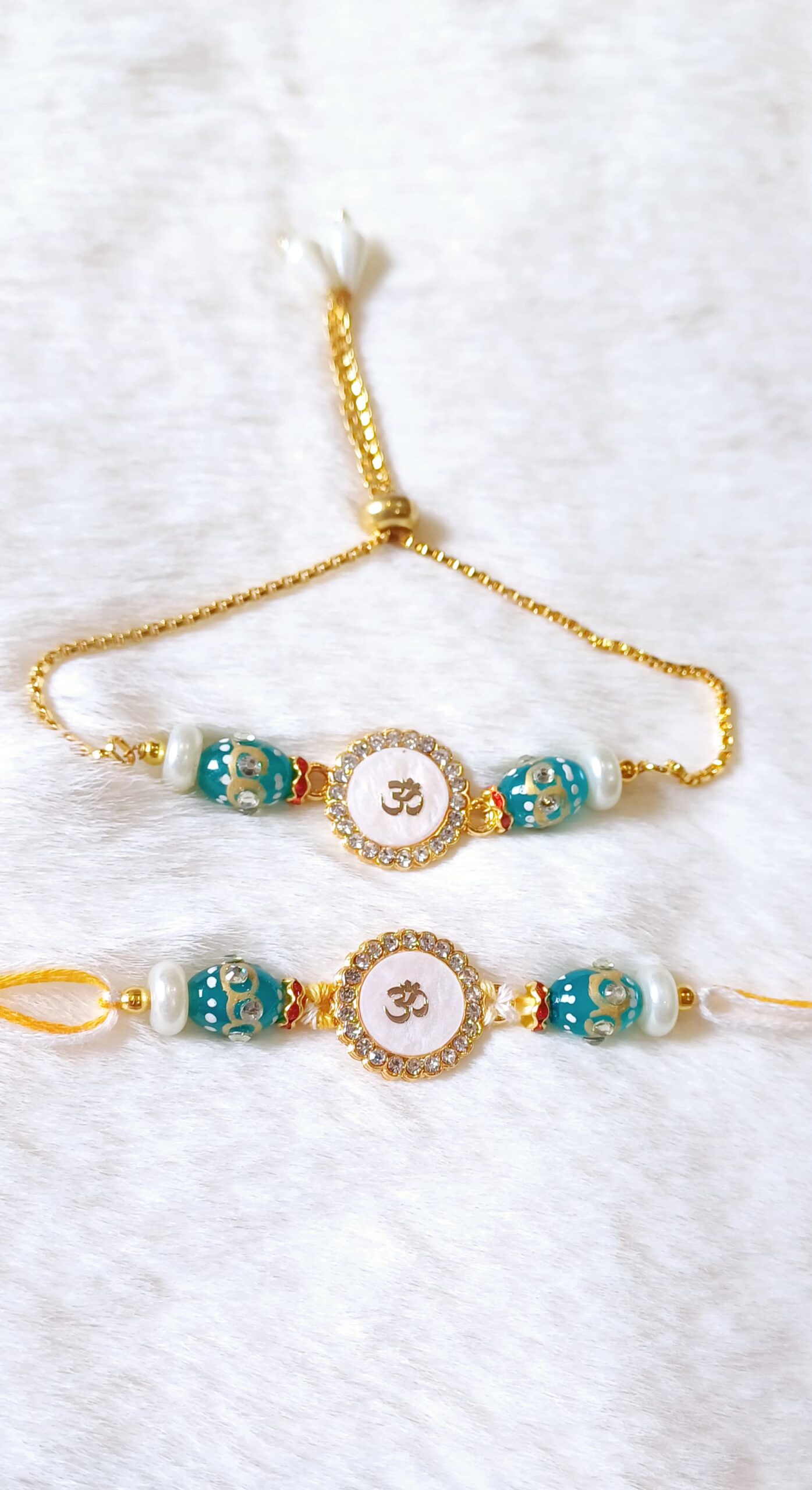Light Blue and White color with Aum design Rakhi