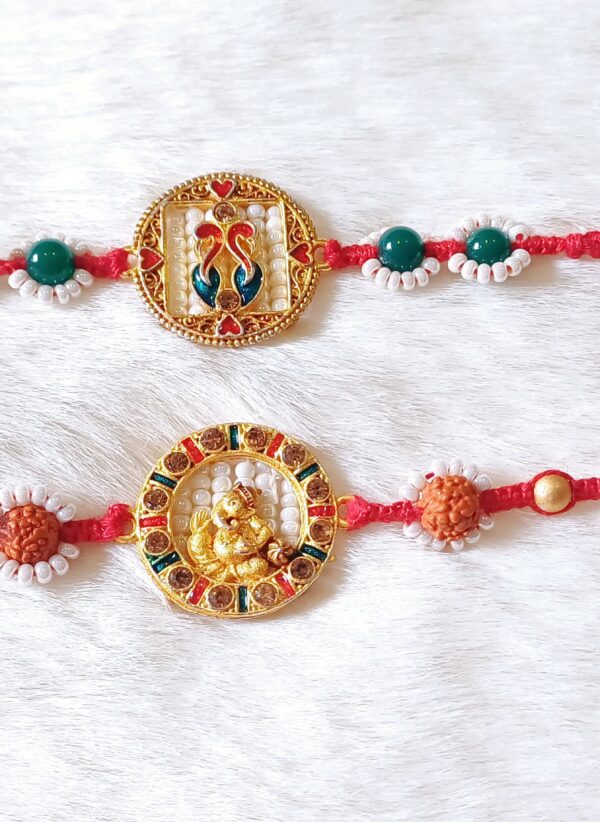 Couple Rakhi with Ganesha and Peacock design in Red and Green color