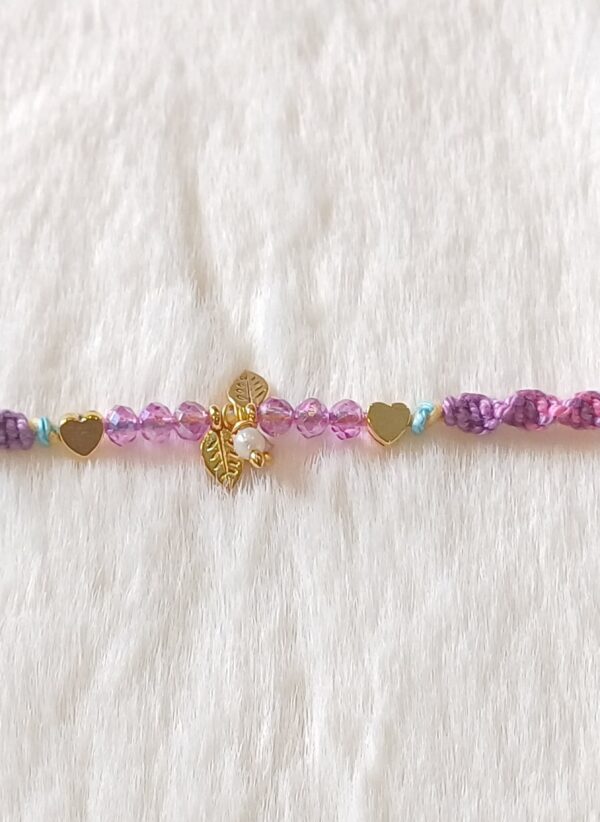 Violet color with leaves and pearl Rakhi - Image 3