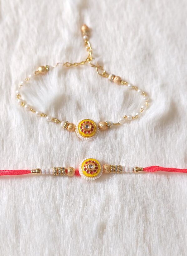 Couple Rakhi with White, Yellow and Red color with Flower Design