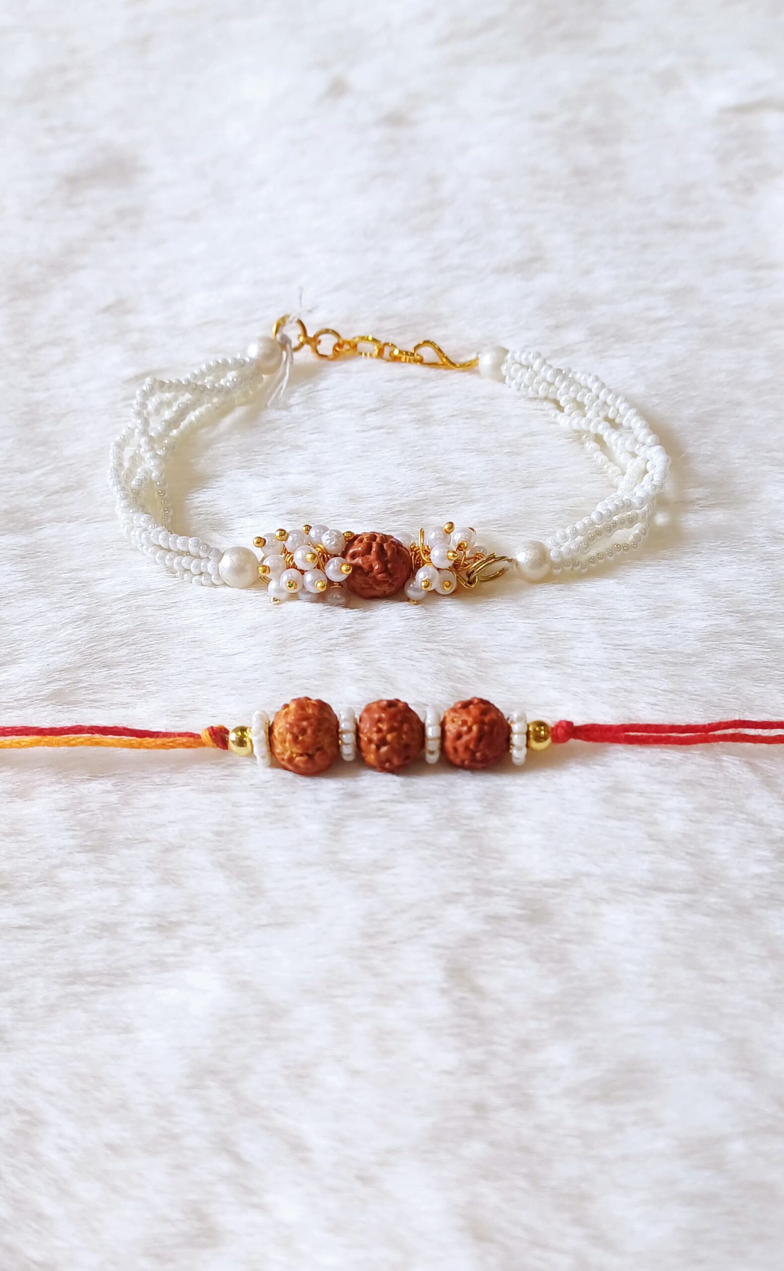 Couple Rakhi with White and Red color with rudraksha