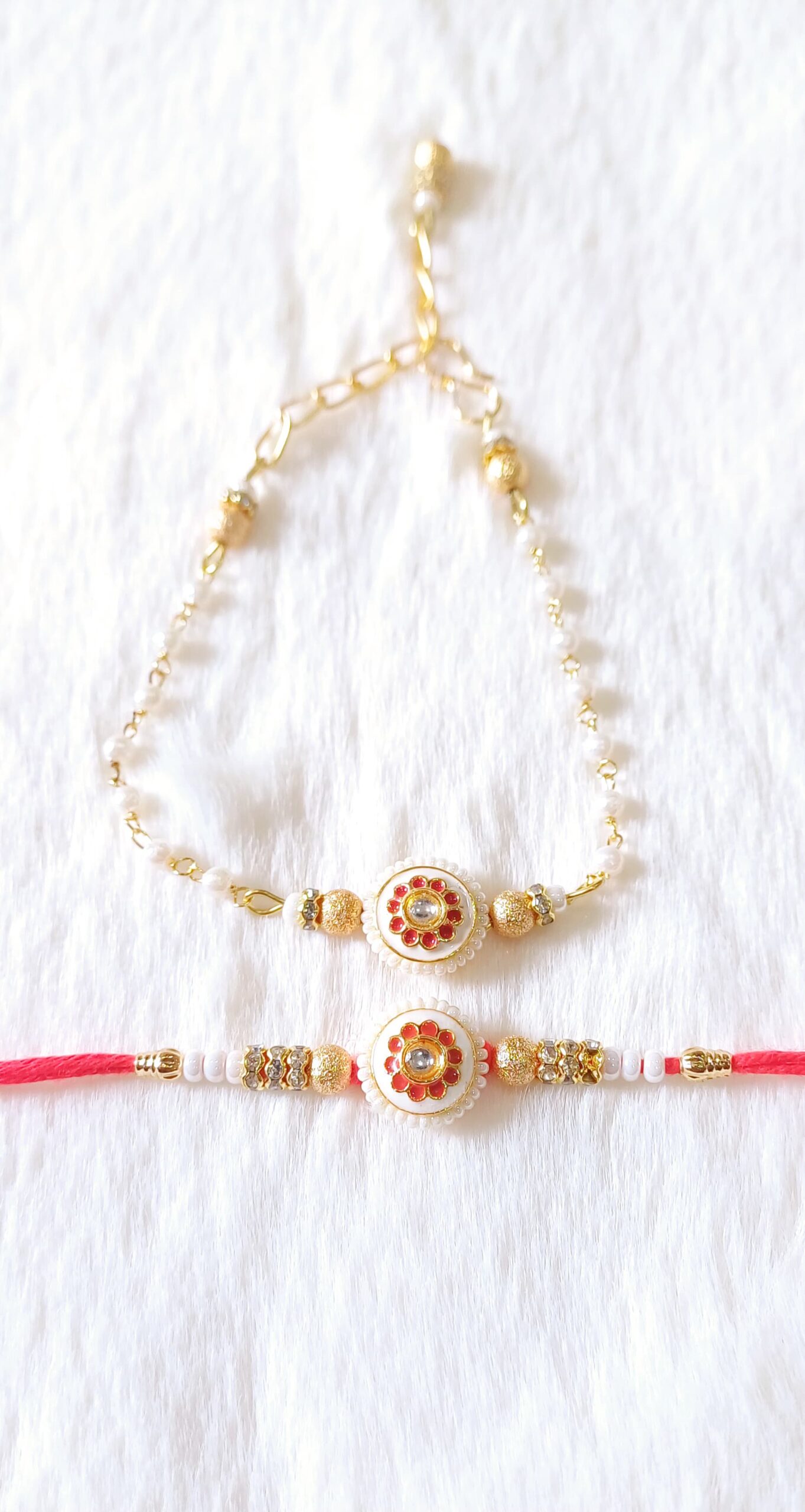 Couple Rakhi with White, Yellow and Red color with Flower Design with white background