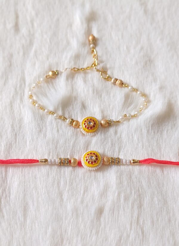 Couple Rakhi with White, Yellow and Red color with Flower Design - Image 3