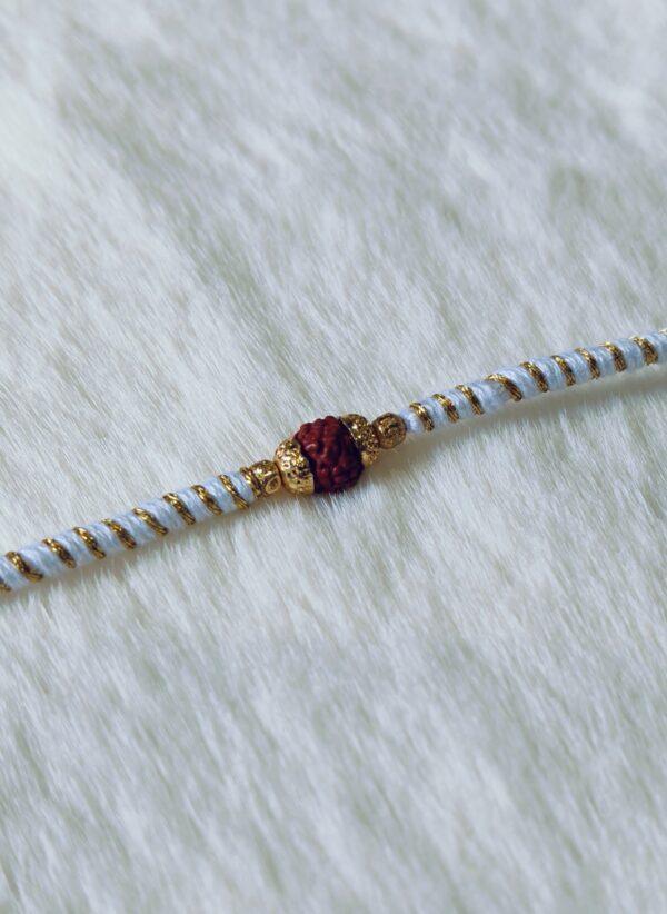 Light Blue and Golden color with Rudraksha Rakhi