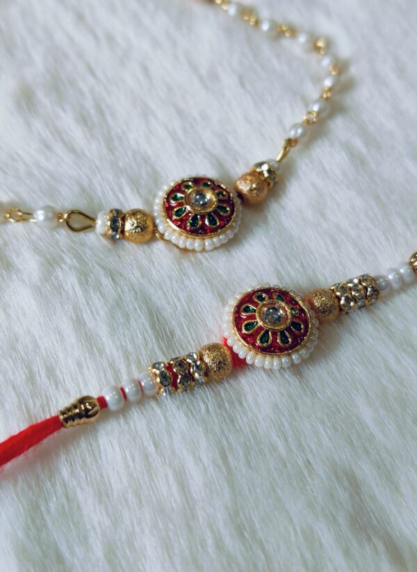 Couple Rakhi with White, Red and Green color with Flower Design with white background - Image 2
