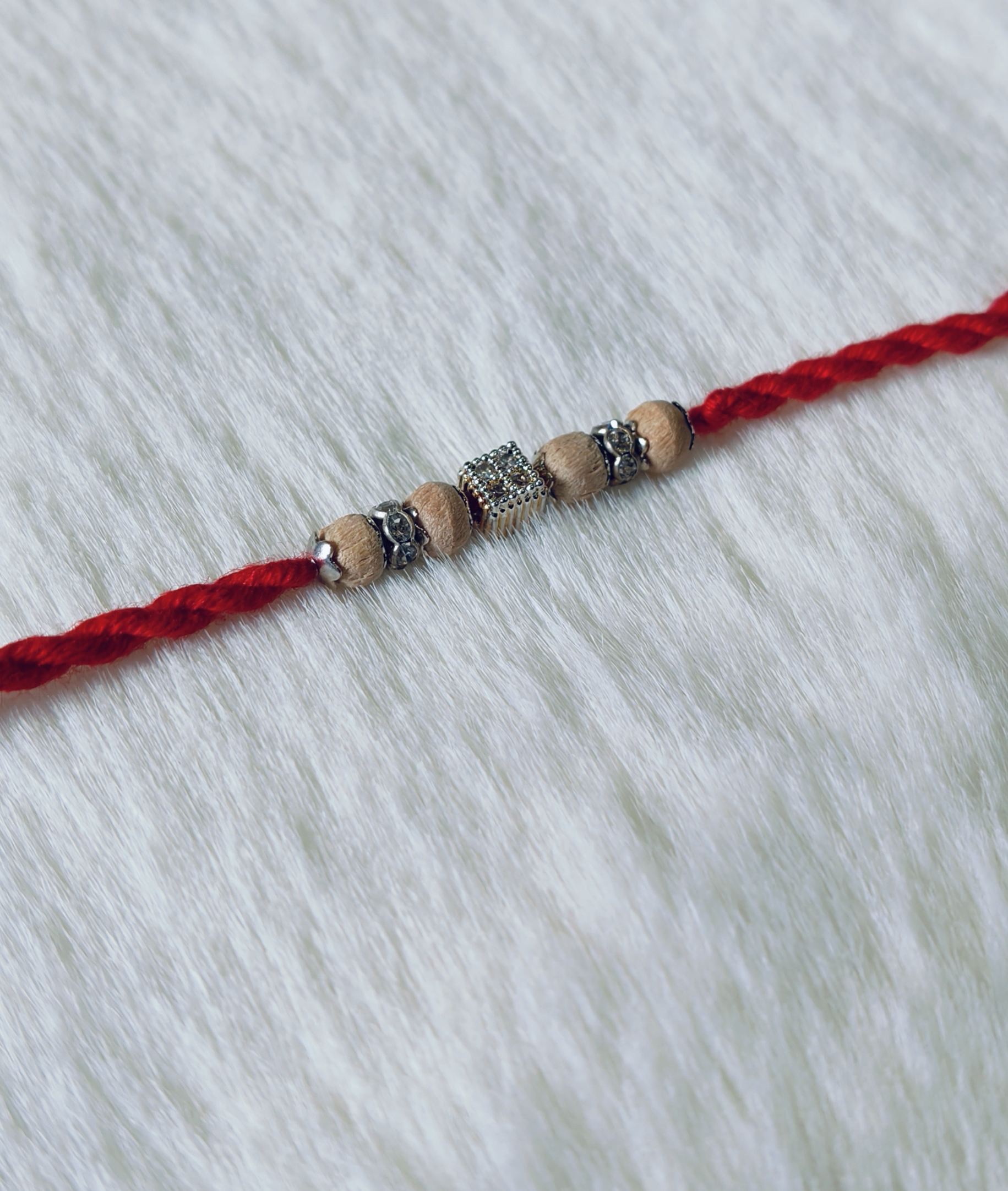 Red color with Rudrakasha beads and Square shape