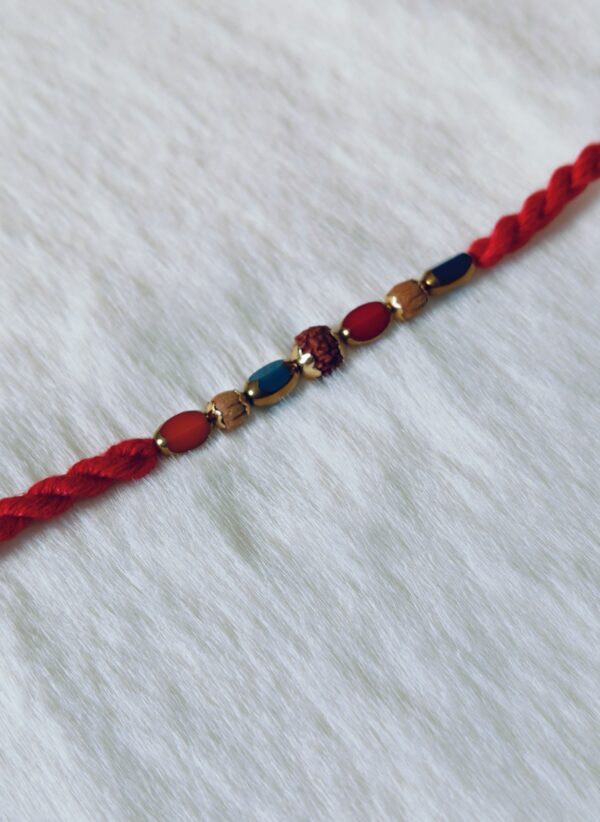 Red color with Rudraksha and Pearls in Blue and Red color