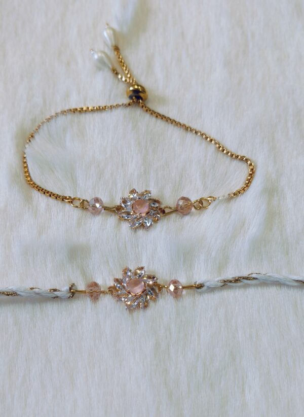 Couple Rakhi - Golden and Blue color with Pink Flower designed pearl - Image 4