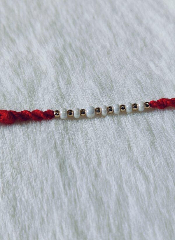 Dark Red color with white and golden pearls