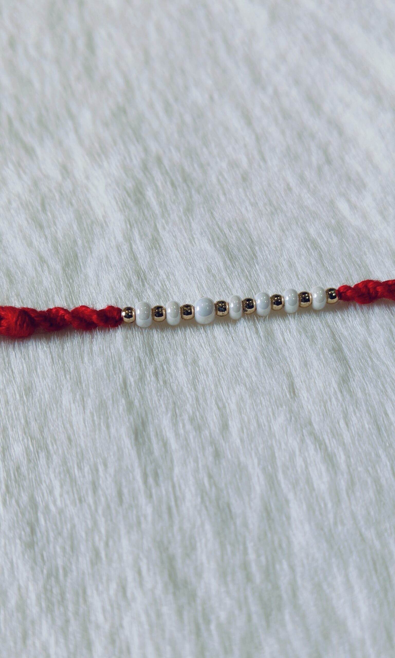Dark Red color with white and golden pearls