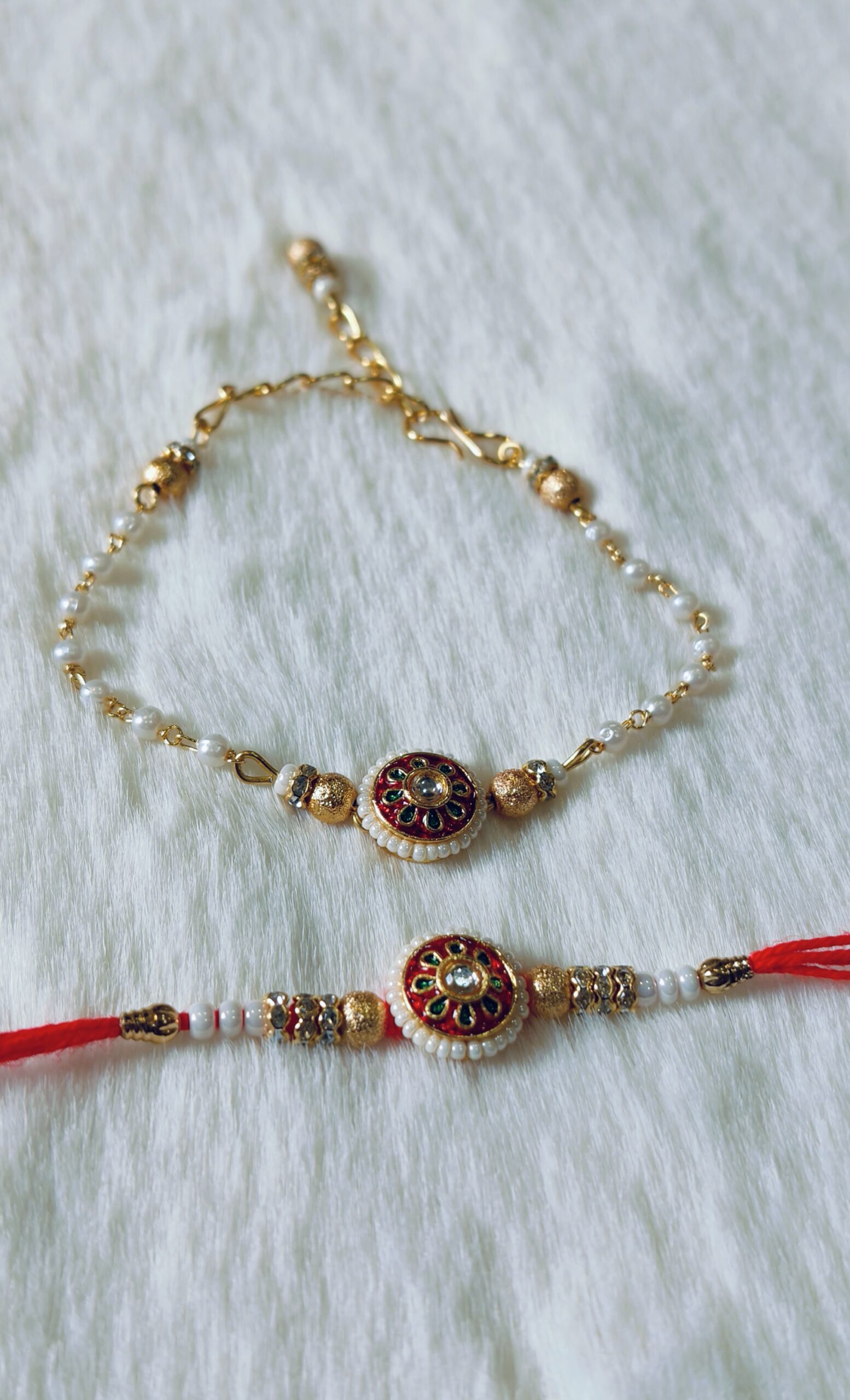 Couple Rakhi with White, Red and Green color with Flower Design with white background